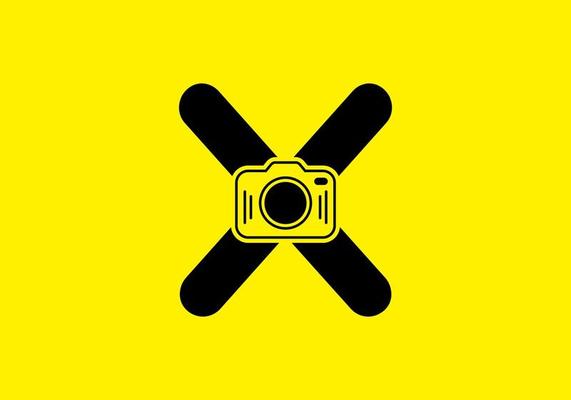 Black yellow of initial X letter with camera
