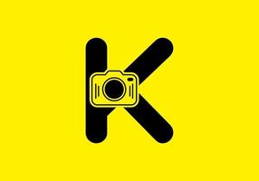 Black yellow of initial K letter with camera vector