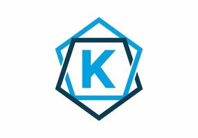 Blue color of initial letter K in pentagon frame