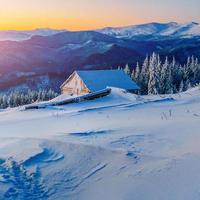 chalets in the mountains at sunset. Carpathian, Ukraine, Europe photo