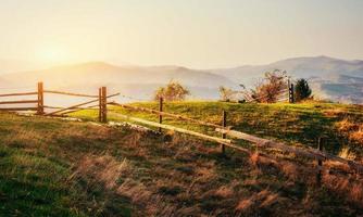 Fantastic sunny hills under morning sky. Dramatic scenery. Carpa photo