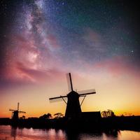 Dutch mill at night. Starry sky. Holland. Netherlands