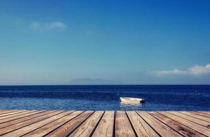 yacht on the background of sea and sky photo