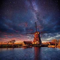 Dutch mill at night. Starry sky. Holland. Netherlands
