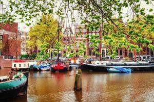 Amsterdam canals and typical houses. photo