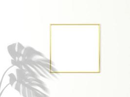 1x1 square Gold frame for photo or picture mockup on white background with shadow of monstera leaves. 3D rendering.