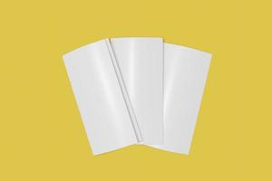 Three Tri fold booklet mockup closed on a yellow background. 3D rendering photo