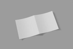 Mockup square booklet, brochure, invitation isolated on a grey background with soft cover and realistic shadow. 3D rendering. photo