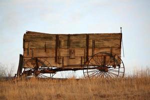 Old grain wagon in early spring photo