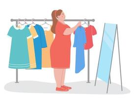 Plump woman in fashion store chooses clothes. She holds dress in her hands and looks at herself in mirror. Retail concept plus-size clothing vector