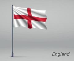 Waving flag of England - territory of United Kingdom on flagpole vector