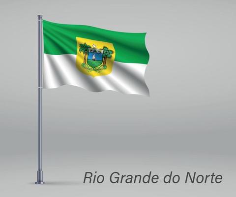 Waving flag of Rio Grande do Norte - state of Brazil on flagpole