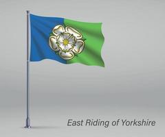 Waving flag of East Riding of Yorkshire - county of England on f vector