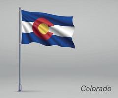 Waving flag of Colorado - state of United States on flagpole. Te vector