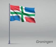 Waving flag of Groningen - province of Netherlands on flagpole. vector