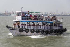 Mumbai, India - October 11, 2015 - Unidentified people on a ferry. Water transport in Mumbai consists mostly of ferries. Services are provided by both government agencies as well as private partners. photo