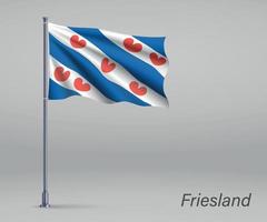 Waving flag of Friesland - province of Netherlands on flagpole.