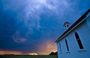 Storm Clouds over Saskatchewan country church photo