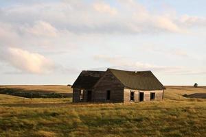 Abandoned farm house in scenic Saskatchewan photo