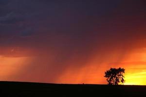 Sunset with rain in scenic Saskatchewan photo