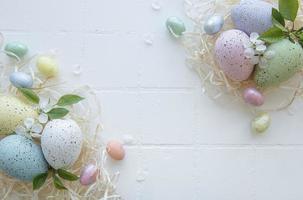 Easter eggs in straw nest photo
