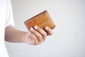 Man hand open an empty wallet with copy space. photo