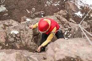 rock climber on the mount photo