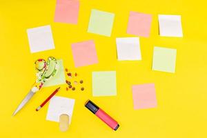 Stationery objects in a yellow background with photo