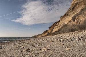 seashore and surf on the beach, no people, secluded vacation spot photo