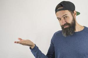 Bearded Adult White Man, Hipster Shows Your Product photo