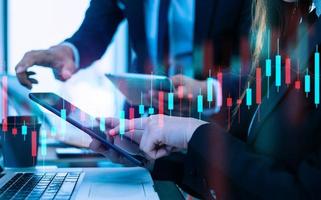 Two stock traiders making analysis of digital market and investment in block chain crypto currency. Stock trade photo