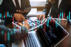 Three stock traiders making analysis of digital market and investment in block photo