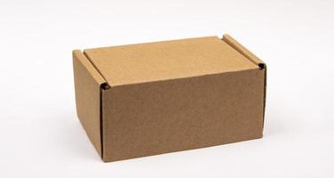 Cardboard box for packaging isolated on white background photo