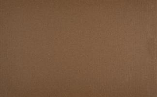 Closed up of corrugated cardboard used as design element background photo
