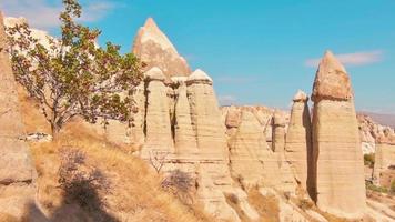 Till down reveal majestic love valley fairy chimneys panorama in Cappadocia . Turkey travel destination concept video