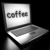 palabra de café en la computadora portátil foto