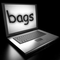 bags word on laptop photo