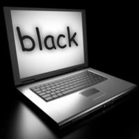 black word on laptop photo