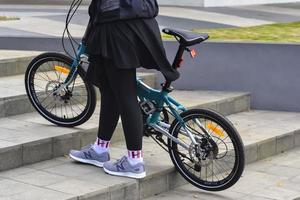 Bekasi, West Java, Indonesia, March 5th 2022. People exercising bicycles in city park on saturday photo