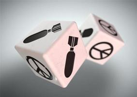 Dice with war and peace symbols on each side. Concept for making a difficult decision. photo