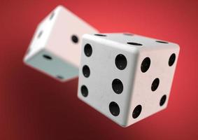 Two die dice captured rolling in mid air. Throwing dice in casino, board game photo
