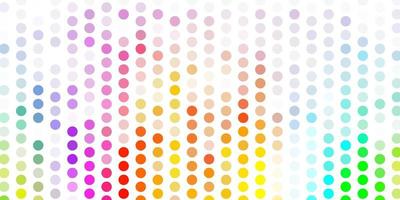 Light multicolor vector backdrop with dots.