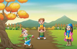 Happy children playing in the autumn park vector