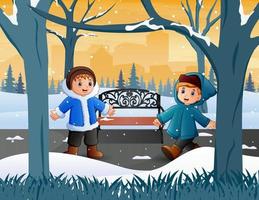 Two boys playing outside in winter vector