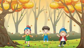 niños felices divirtiéndose y jugando con hojas de otoño en el bosque vector