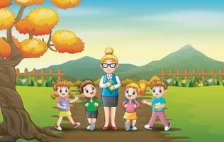 A women teacher with the students in the park vector