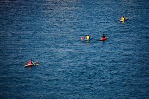 canoeists in sea photo