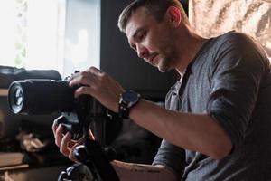 photographer in the process of shooting in the Studio photo