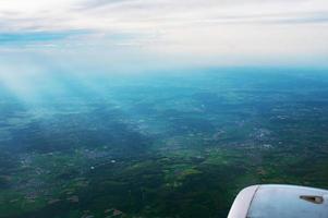 beautiful amazing view to the land and sky from the aircraft photo