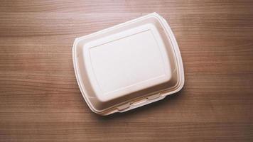 take-away box or take-out foam container from food delivery service photo